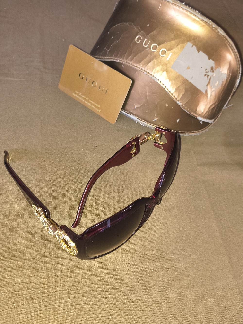 Gucci Women's Burgundy Sunglasses with Gold Emblem Detailing